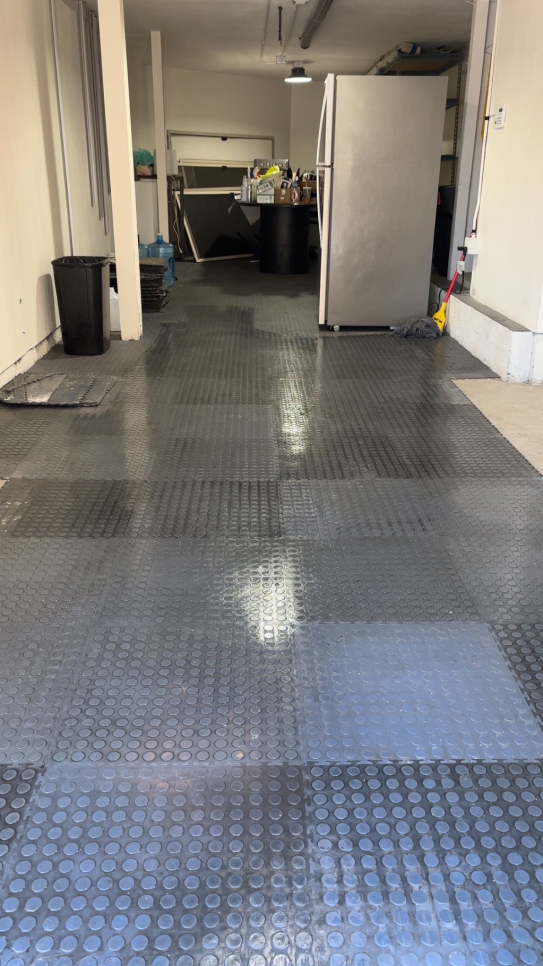 Garage floor tiles installed by One Way Flooring