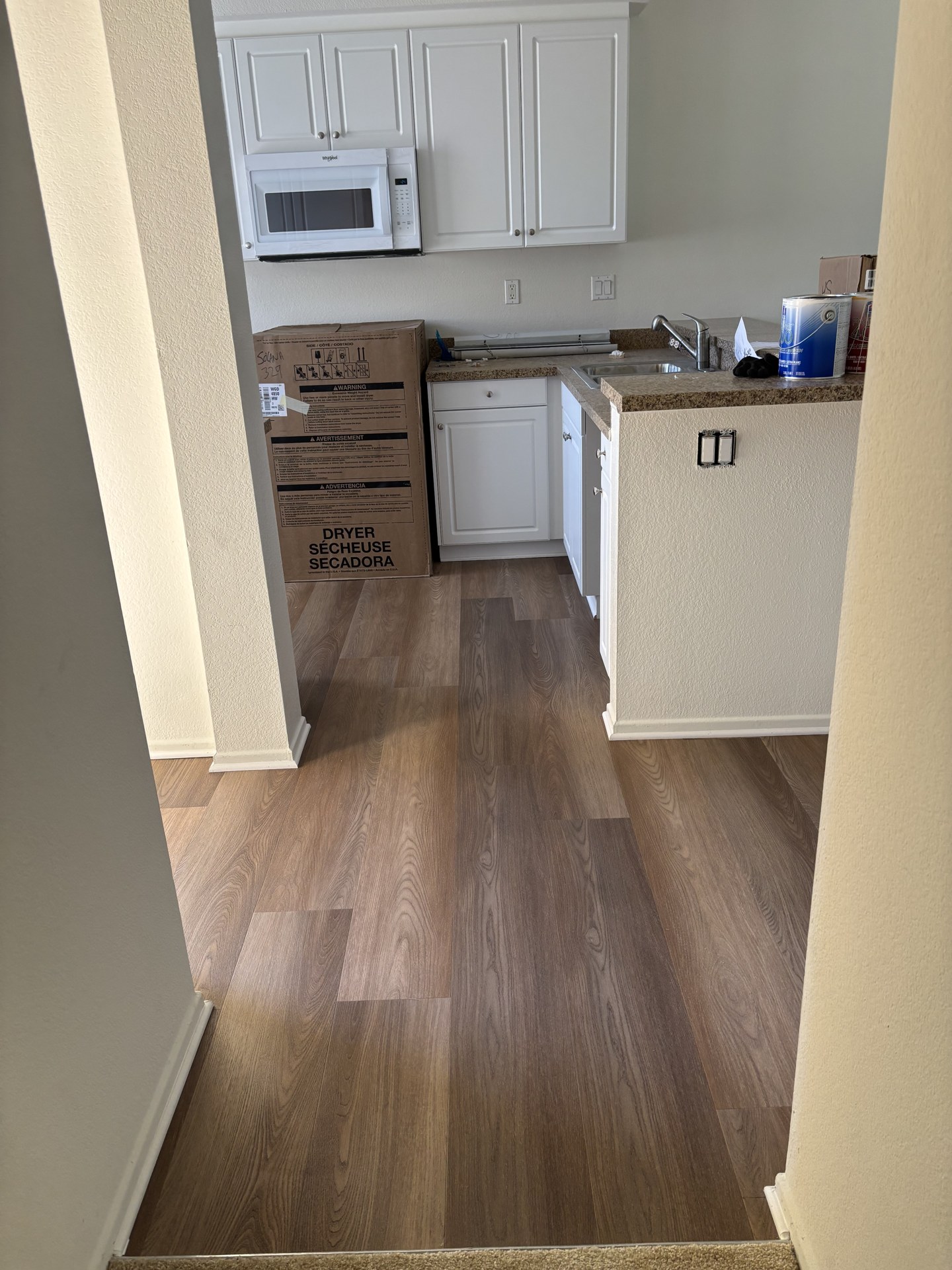 Kitchen plank flooring installed by One Way Flooring